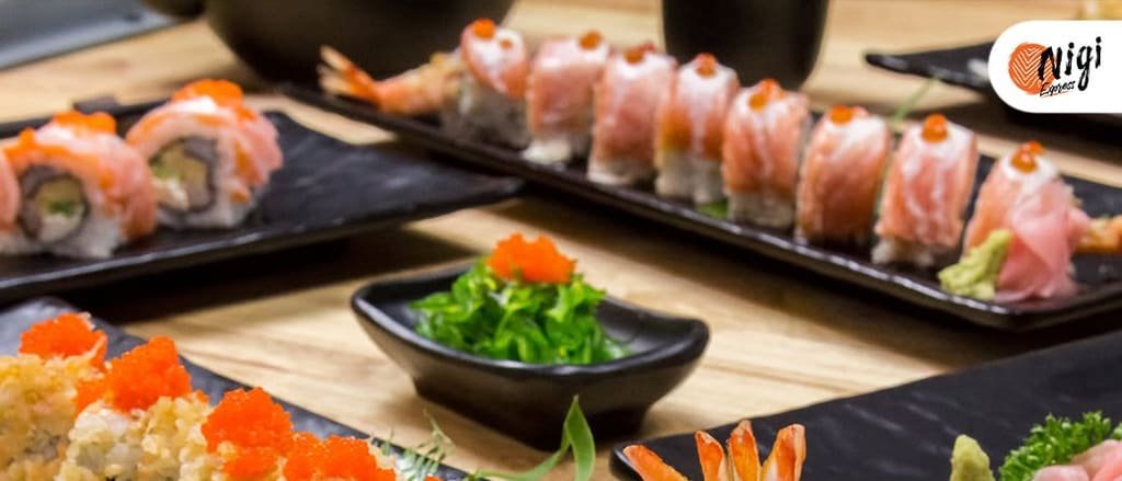 Nigiri being plated at the Nigi Express counter